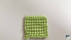 Punto tunecino por detrás